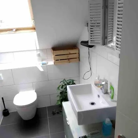 Dachgeschosswohnung In *